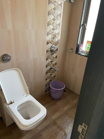 Bathroom in 2.5 BHK Apartment at Lashkaria Anurag CHS, Andheri West – for Sale