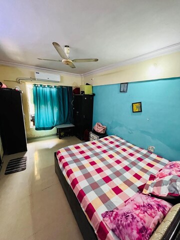 Bedroom in 2 BHK Apartment at Vishwa Prakash Apartments CHS, Andheri West – for Rent