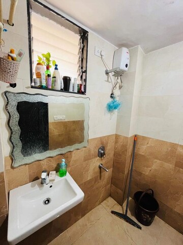 Bathroom in 2 BHK Apartment at Vishwa Prakash Apartments CHS, Andheri West – for Rent