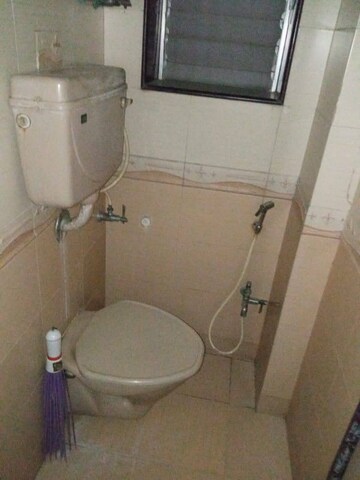 Bathroom in 1 BHK Apartment at K Raheja Palm Court, Malad West – for Rent