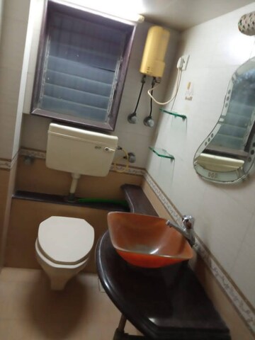 Bathroom in 1 BHK Apartment at K Raheja Palm Court, Malad West – for Rent