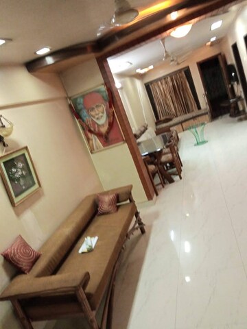 Living Room in 1 BHK Apartment at K Raheja Palm Court, Malad West – for Rent
