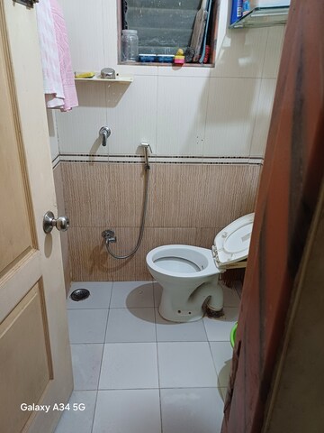 Bathroom in 2 BHK Apartment at Kopar Khairane – for Sale