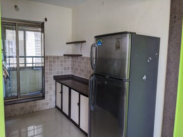 Kitchen in 3 BHK Apartment at Neelkanth Greens, Manpada – for Rent