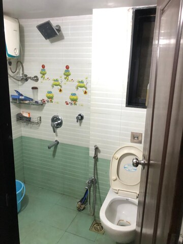 Bathroom in 2 BHK Apartment at Soham Garden, Manpada – for Rent