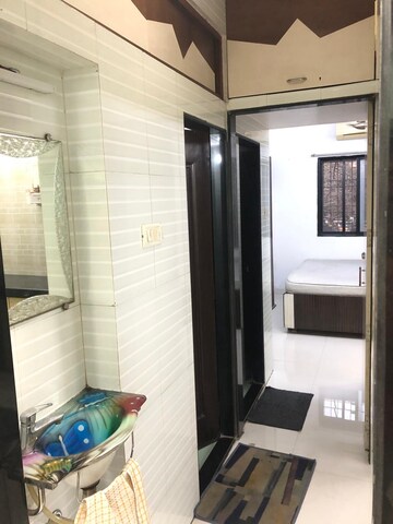 Bathroom in 2 BHK Apartment at Soham Garden, Manpada – for Rent