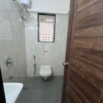 Bathroom in 1.5 BHK Apartment at Mohite Anuj Aura, Tps Colony – for Rent