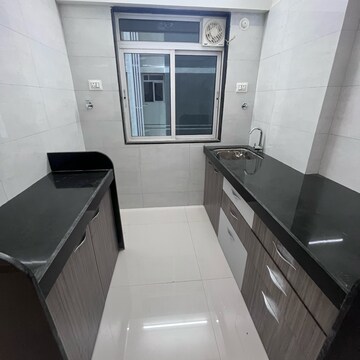 Kitchen in 1.5 BHK Apartment at Mohite Anuj Aura, Tps Colony – for Rent