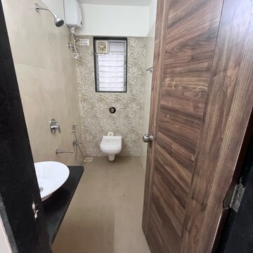 Bathroom in 1.5 BHK Apartment at Mohite Anuj Aura, Tps Colony – for Rent