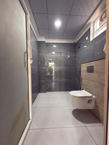 Bathroom in 4 BHK Builder Floor at Mansarovar – for Sale