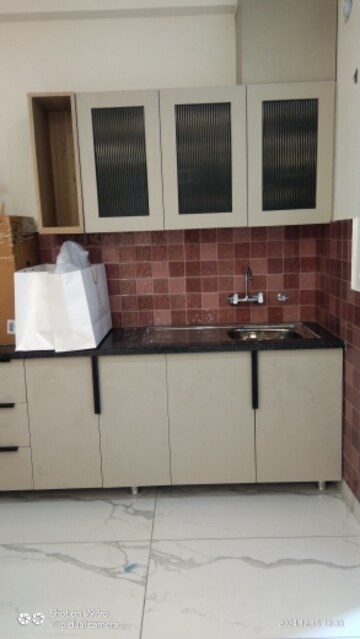 Kitchen in 3 BHK Apartment at Vrinda Heritage Skyward, Sector 1 Greater Noida – for Sale