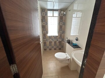 Bathroom in 2 BHK Apartment at Rama Fusion Towers, Hinjewadi – for Rent