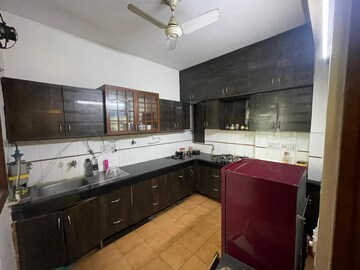 Kitchen in 3 BHK Apartment at The Cedar Estate, Sector 54 – for Sale