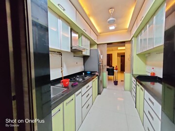 Kitchen in 3 BHK Apartment at DV Fressia Ill, Dahisar West – for Rent