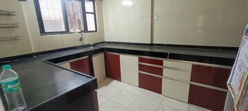 Kitchen in 2 BHK Apartment at Neco Gardens, Viman Nagar – for Rent