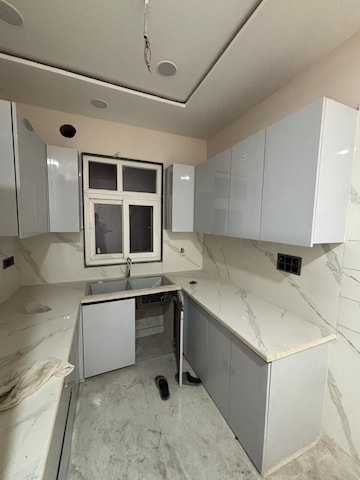 Kitchen in 3 BHK Builder Floor at Mansarover Garden – for Sale