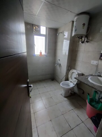 Bathroom in 2 BHK Apartment at SS The Coralwood, Sector 84 – for Rent