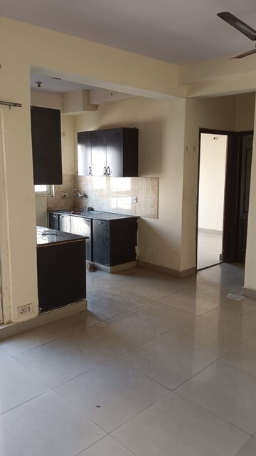 Living Room in 2 BHK Apartment at Aims Golf City, Sector 75 – for Rent