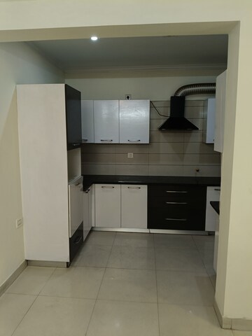 Kitchen in 3 BHK Apartment at Dhakoli Village – for Sale