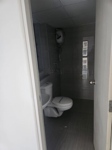 Bathroom in 2 BHK Apartment at Runwal Gardens, Dombivli East – for Rent