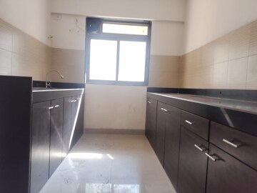 Kitchen in 3 BHK Apartment at Lodha Splendora, Ghodbunder Road – for Sale