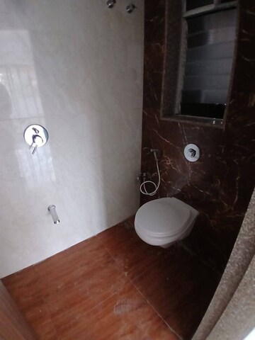 Bathroom in 1 BHK Apartment at Sunteck Maxxworld, Naigaon East – for Rent