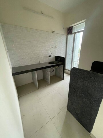 Kitchen in 1 BHK Apartment at Sunteck Maxxworld, Naigaon East – for Rent