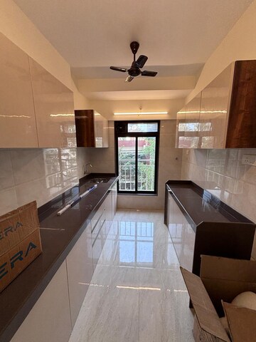 Kitchen in 2 BHK Apartment at Chaitanya Anand Lunkhod CHSL, Andheri West – for Rent