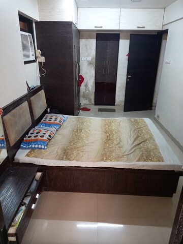Bedroom in 2 BHK Apartment at Madhurima CHS, Andheri West – for Rent