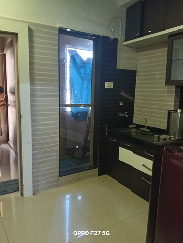 Living Room in 1 BHK Apartment at Jamuna Tower, Mira Road – for Rent