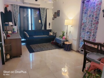 Living Room in 1 BHK Apartment at MICL Aaradhya Parkwood, Mira Road – for Sale