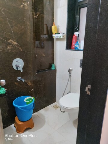 Bathroom in 1 BHK Apartment at MICL Aaradhya Parkwood, Mira Road – for Sale