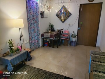 Living Room in 1 BHK Apartment at MICL Aaradhya Parkwood, Mira Road – for Sale