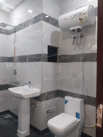 Bathroom in 2 BHK Apartment at Paschim Vihar – for Rent