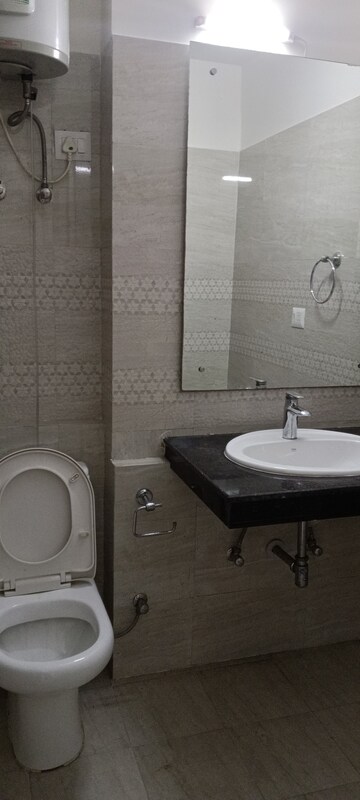 Bathroom in 3 BHK Apartment at Adani M2K Oyster Grande, Sector 102 – for Rent