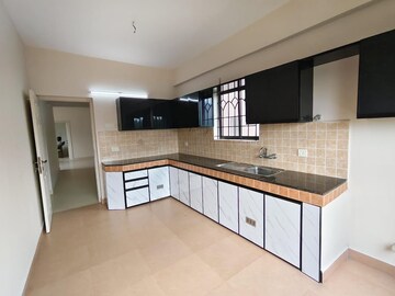 Kitchen in 3 BHK Apartment at Kakkanad – for Rent