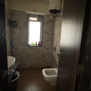 Bathroom in 3 BHK Apartment at Siddhi Highland Park, Kailash Nagar – for Rent