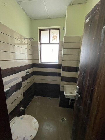 Kitchen in 2 BHK Apartment at Ansal Sushant Lok I, Sector 43 – for Rent