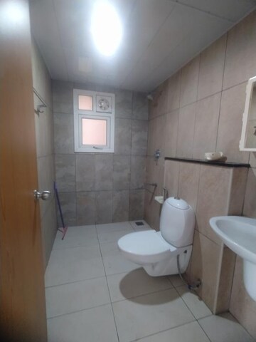 Bathroom in 1 BHK Apartment at Prestige Song Of The South, Yelenahalli – for Rent