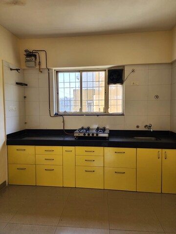 Kitchen in 2 BHK Apartment at Whispering Winds, Aundh – for Rent