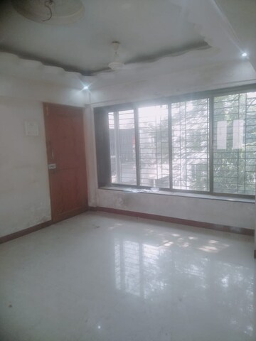 Room in 2 BHK Apartment at Sarovar CHS Borivalli, Borivali West – for Rent