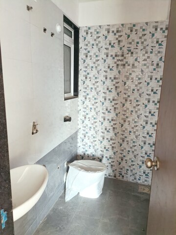 Bathroom in 1 BHK Apartment at Mahavir Kalpavruksha, Ghodbunder Road – for Sale