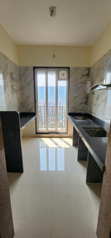 Kitchen in 2 BHK Apartment at Gajra Bhoomi Premium Tower, Kharghar – for Rent