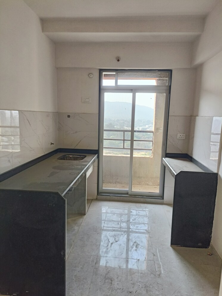 Kitchen, mahavir-kalpavruksha 2 Bedroom 665 Sq.Ft. Apartment In Ghodbunder Road Thane 8128057