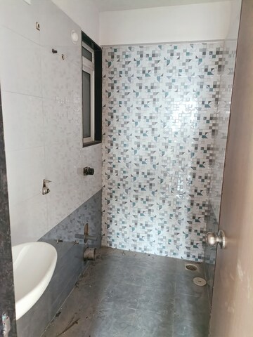 Bathroom in 2 BHK Apartment at Mahavir Kalpavruksha, Ghodbunder Road – for Sale