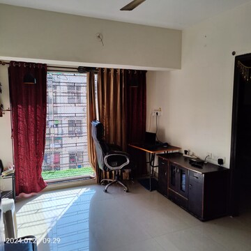 Living Room in 1 BHK Apartment at Spring Grove Uno Society, Kandivali East – for Rent