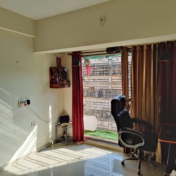 Living Room in 1 BHK Apartment at Spring Grove Uno Society, Kandivali East – for Rent