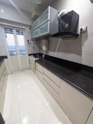 Kitchen in 2 BHK Apartment at Mehta Amrut Pearl, Kalyan West – for Rent