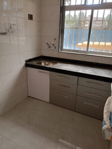Kitchen in 1 BHK Apartment at Golden Chawre Plus, Virar West – for Sale