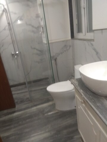 Bathroom in 4 BHK Builder Floor at New Friends Colony – for Rent